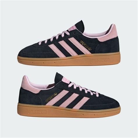 fake black and pink adidas|black Adidas with pink stripes.